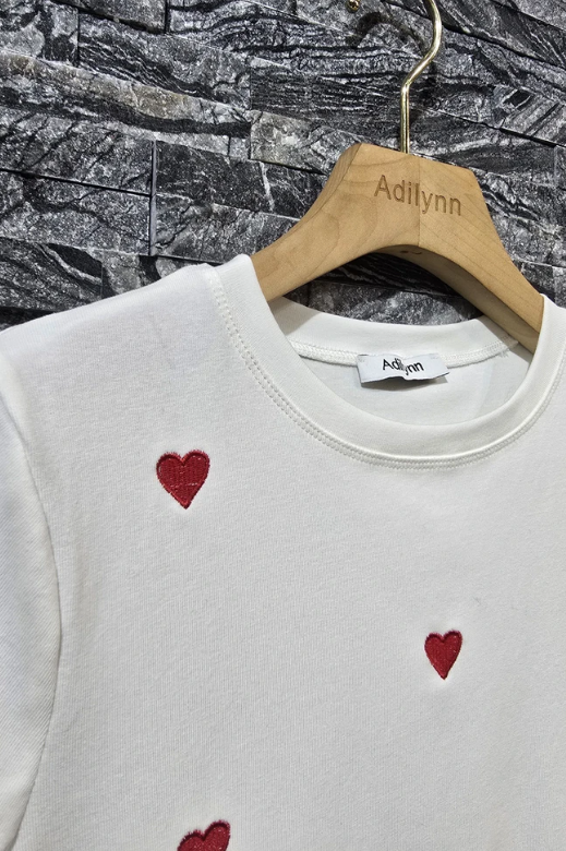 White top with hearts